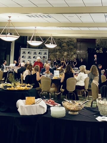 room full of people sitting at tables