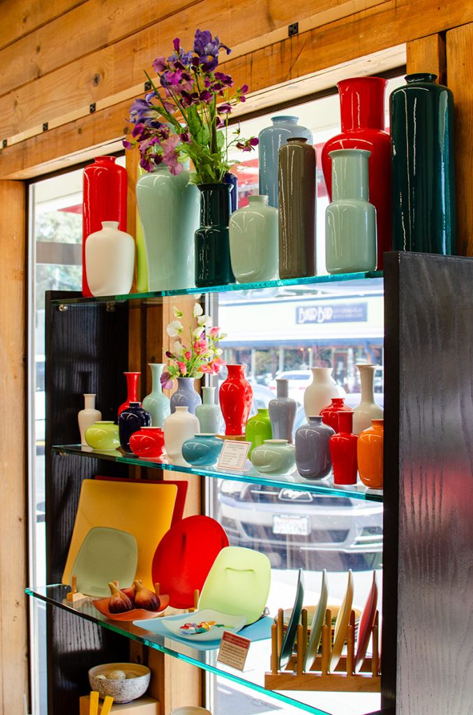 display of vases plates and dishes in window