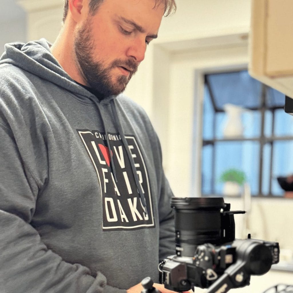 real estate photographer, mike ward, setting up camera on gimble for real estate photography in Curtis Park neighborhood of Sacramento, CA