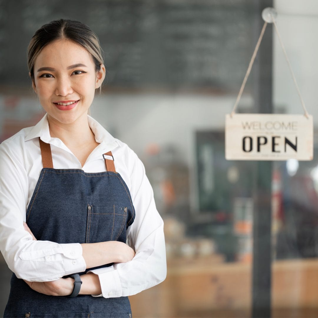 woman business owner at coffeeshop