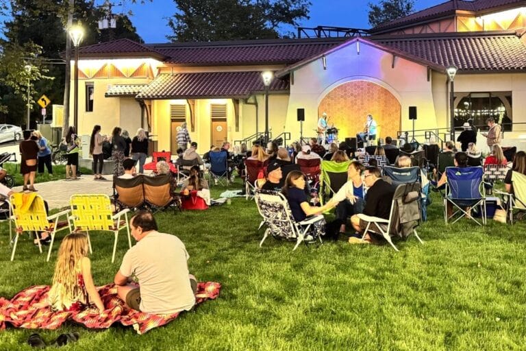 people enjoying a concert on opening night at Fair Oaks Village 2025