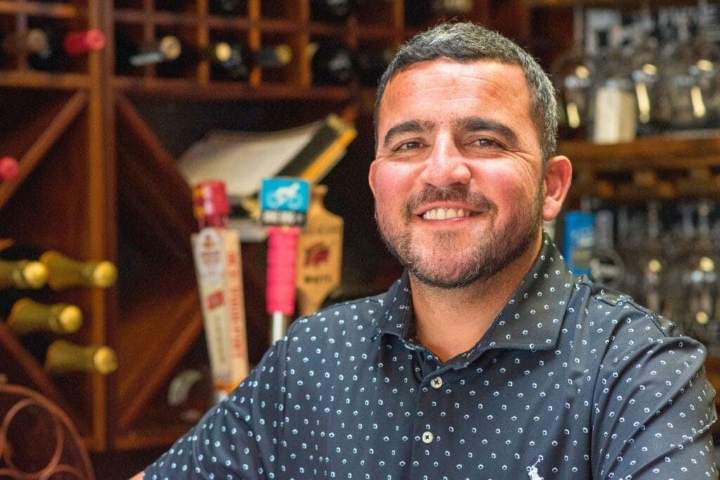 Franco behind the bar at Bodega Biondi Fair Oaks Village