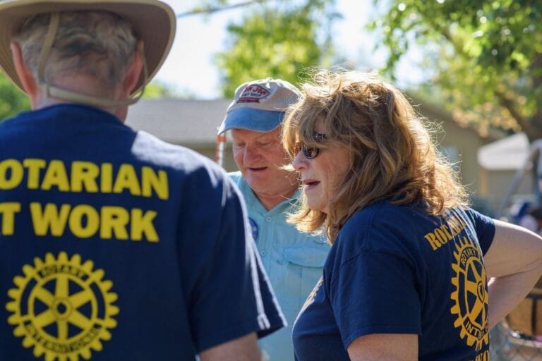 rotary club of fair oaks members at work with infinite friends garden