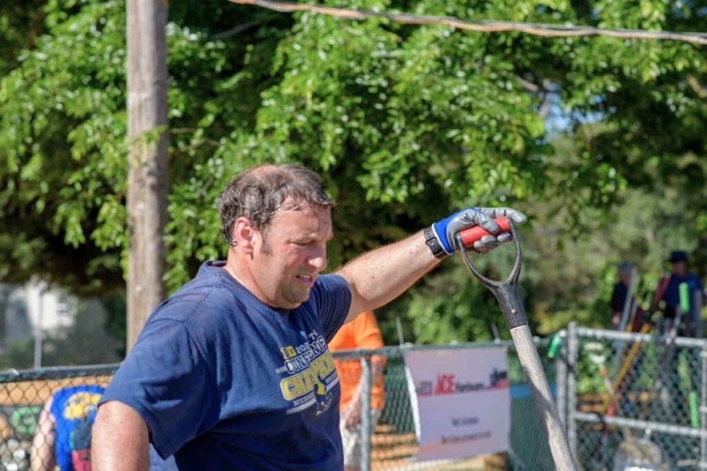 man taking a break infinite friends garden project